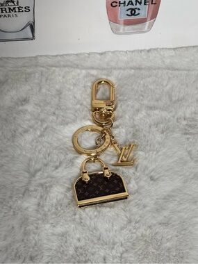 Iconic LV Keychain Alma Charm Gold Hardware